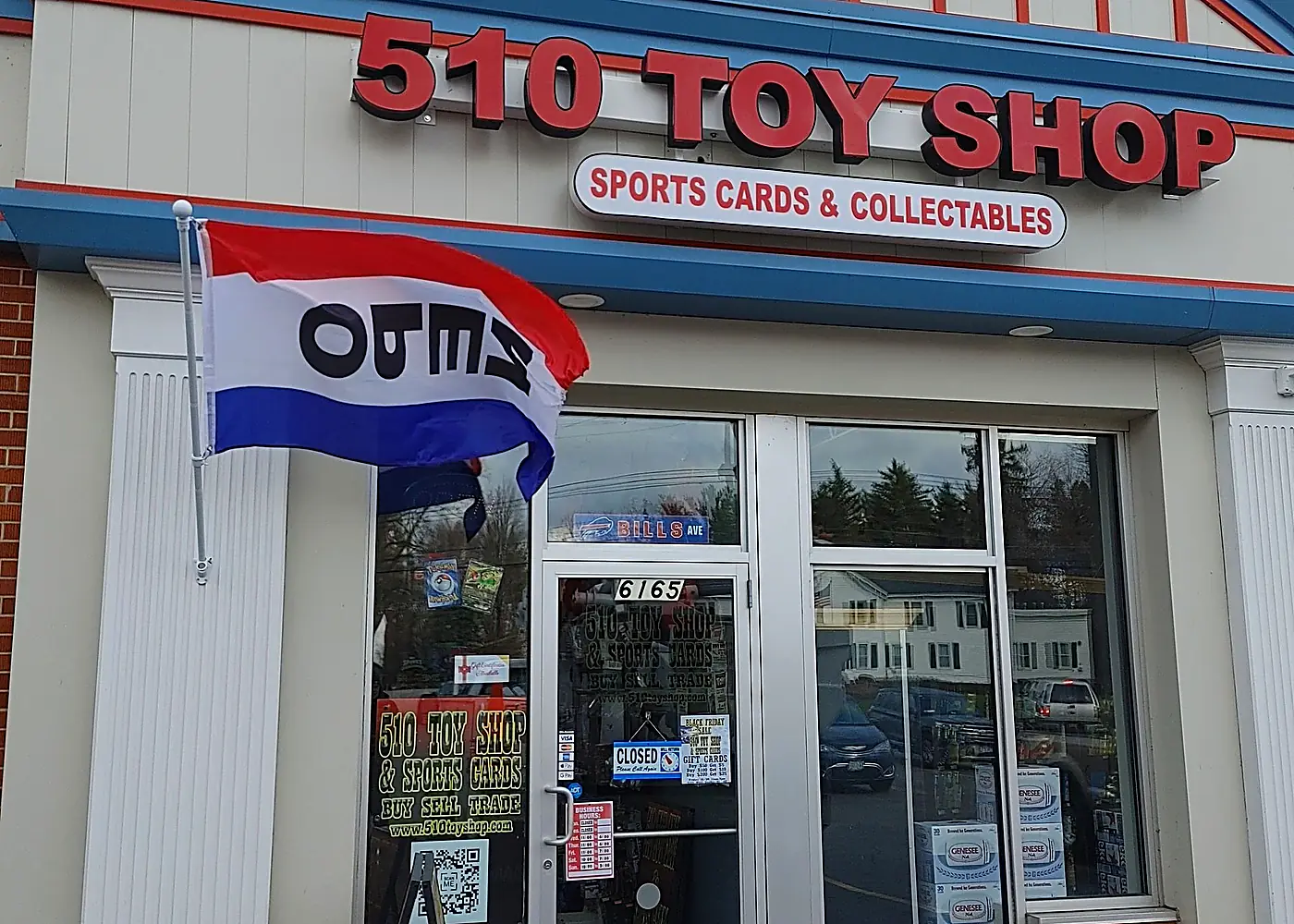 The storefront of 510 Toy Shop and Sports Cards on West Quaker Street.